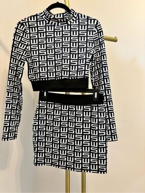 chic Black & White Geometric Long-Sleeve Crop Top and Skirt Set